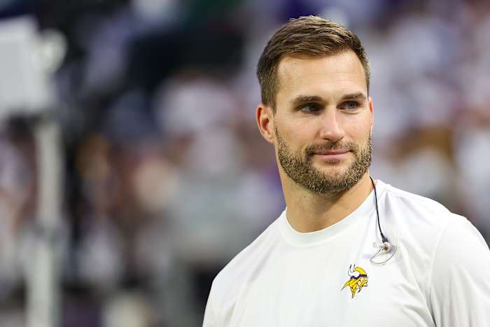 Dec 24, 2023; Minneapolis, Minnesota, USA; Minnesota Vikings quarterback Kirk Cousins (8) looks on from the bench during the second quarter against the Detroit Lions at U.S. Bank Stadium